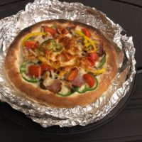 薪ストーブでピザ